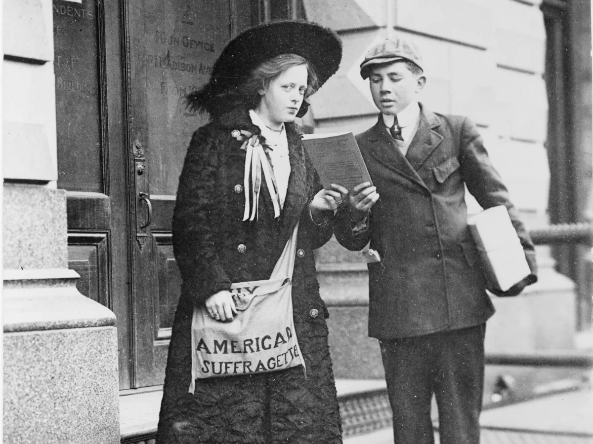 A Young Suffragette Distrubing Pamphlets